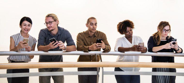 Five people checking their credit report for errors on their phone.